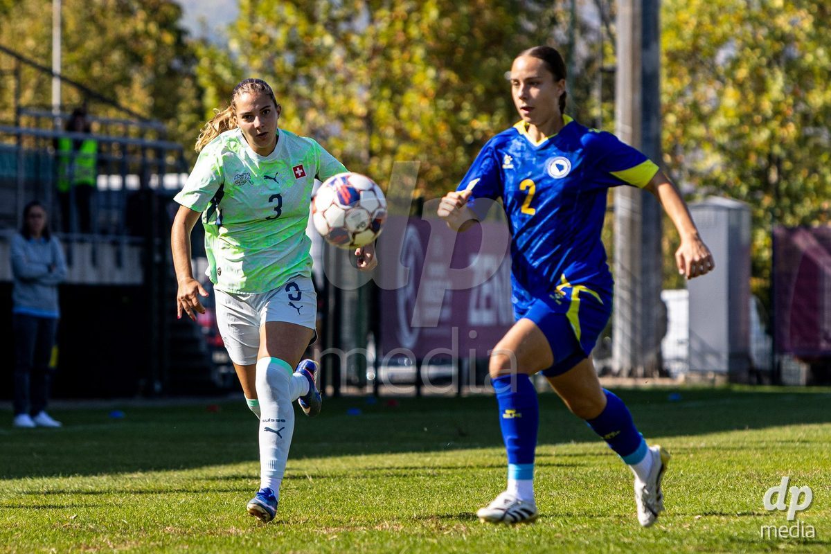 ZENICA, BOSNIA AND HERZEGOVINA - OCTOBER 7: Emilia Brunner of Switzerland and Lamija Bjelica of Bosnia and Herzegovina during the UEFA Womens European Under-19 Qualifier match between Switzerland and Bosnia and Herzegovina at FF BH Football Training Centre on October 7, 2026 in Zenica, Bosnia and Herzegovina.