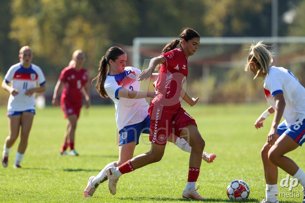 KAKANJ, BOSNIA AND HERZEGOVINA - OCTOBER 7: Katie Scott of England and Mila Bischoff of Denmark during the UEFA Womens European Under-19 Qualifier match between England and Denmark at Mladost Stadium on October 7, 2026 in Kakanj, Bosnia and Herzegovina.