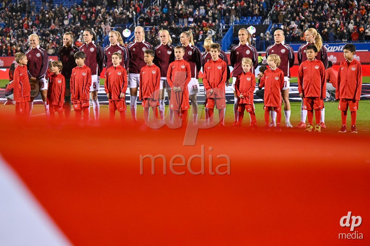 MONTREAL, CANADA - OCTOBER 9: Players of Denmark during the national anthem prior to to the International Women's Friendly football match between Canada and Denmark at Stade Saputo on October 9, 2026 in Montreal, Canada.