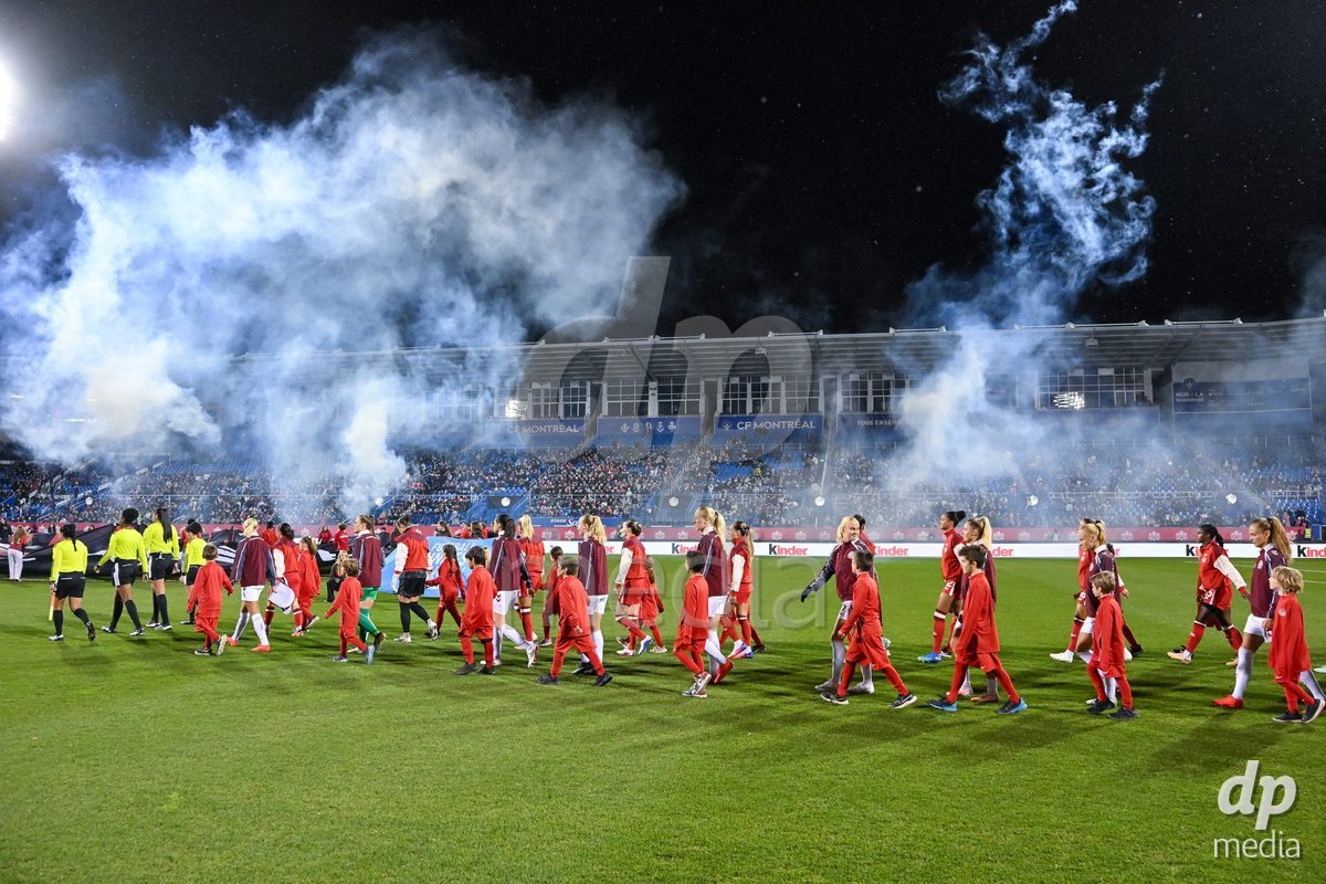 MONTREAL, CANADA - OCTOBER 9: Players of Denmark walk in for the national anthem prior to the International Women's Friendly football match between Canada and Denmark at Stade Saputo on October 9, 2026 in Montreal, Canada.