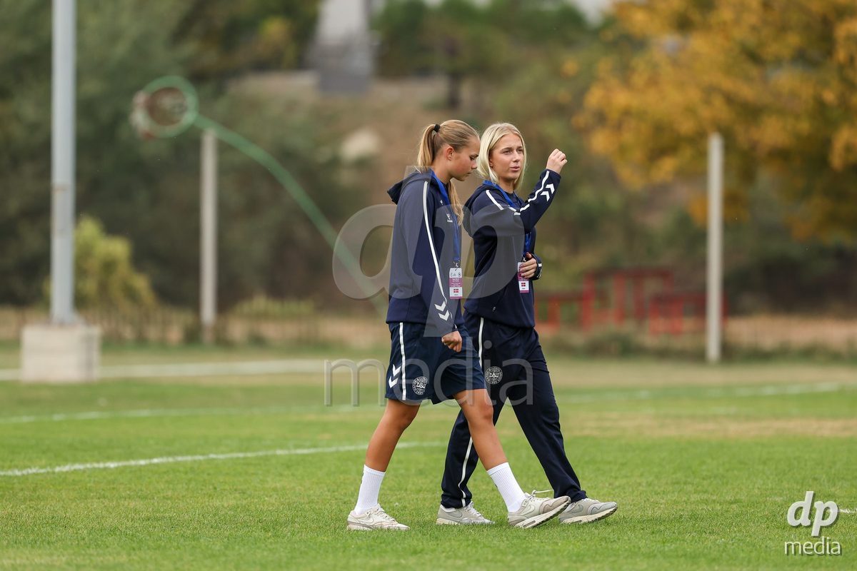 KAKANJ, BOSNIA AND HERZEGOVINA - OCTOBER 10: Sarah Lindorff Vinther of Denmark and Frederikke Ludvigsen of Denmark inspects the pitch prior to the UEFA Womens European Under-19 Qualifier match between Denmark and Bosnia and Herzegovina at Mladost Stadium on October 10, 2026 in Kakanj, Bosnia and Herzegovina. Photo: Armin Durgut/Pixsell/DP Media