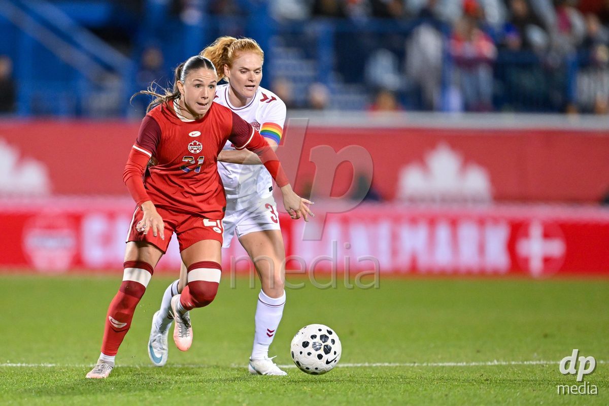 MONTREAL, CANADA - OCTOBER 9: DB Pridham of Canada (L and Stine Ballisager of Denmark (R) battle for the ball (duel) during the International Women's Friendly football match between Canada and Denmark at Stade Saputo on October 9, 2026 in Montreal, Canada.