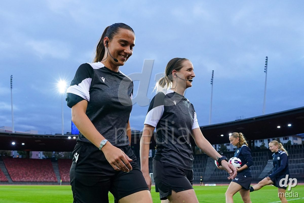 ZURICH, SWITZERLAND - OCTOBER 2: Referee Jessica Domingues (L) and Nadine Reichmuth during the AXA Women's Super League match between GC Frauenfussball and FC Zurich at Letzigrund on October 2, 2026 in Zurich, Switzerland.