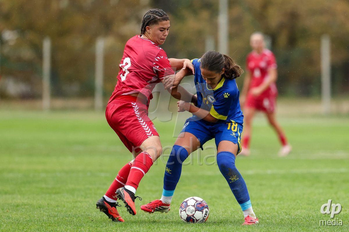 KAKANJ, BOSNIA AND HERZEGOVINA - OCTOBER 10: Thea Petersen of Denmark and Hana Mesan of Bosnia and Herzegovina during the UEFA Womens European Under-19 Qualifier match between Denmark and Bosnia and Herzegovina at Mladost Stadium on October 10, 2026 in Kakanj, Bosnia and Herzegovina. Photo: Armin Durgut/Pixsell/DP Media