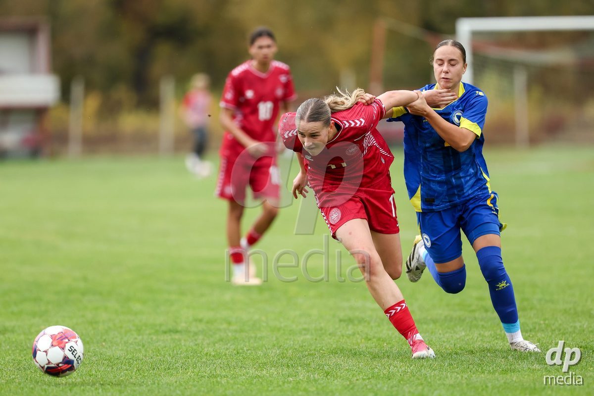 KAKANJ, BOSNIA AND HERZEGOVINA - OCTOBER 10: Andrea Thierry of Denmark and Lamija Bjelica of Bosnia and Herzegovina battles for the ball during the UEFA Womens European Under-19 Qualifier match between Denmark and Bosnia and Herzegovina at Mladost Stadium on October 10, 2026 in Kakanj, Bosnia and Herzegovina. Photo: Armin Durgut/Pixsell/DP Media