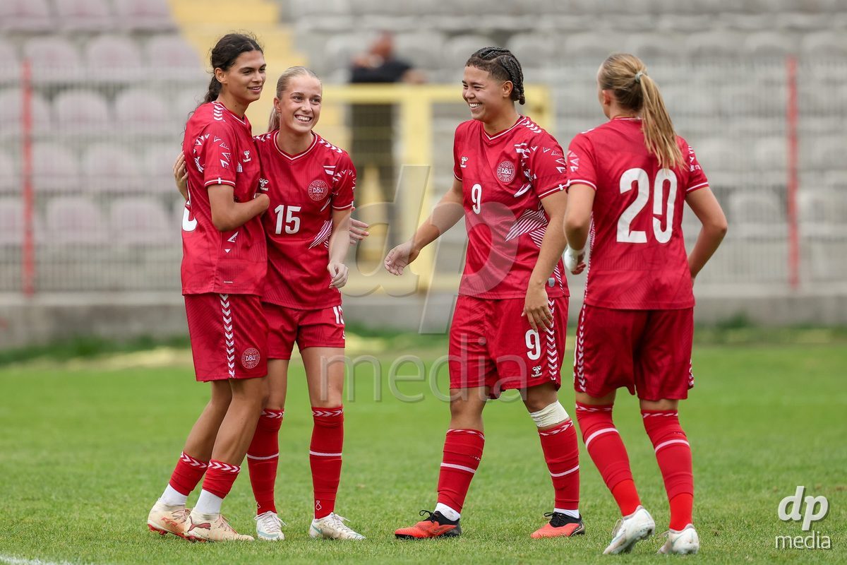 KAKANJ, BOSNIA AND HERZEGOVINA - OCTOBER 10: Mila Bischoff of Denmark, Frederikke Ludvigsen of Denmark and Thea Petersen of Denmark celebrate after scoring a goal during the UEFA Womens European Under-19 Qualifier match between Denmark and Bosnia and Herzegovina at Mladost Stadium on October 10, 2026 in Kakanj, Bosnia and Herzegovina. Photo: Armin Durgut/Pixsell/DP Media