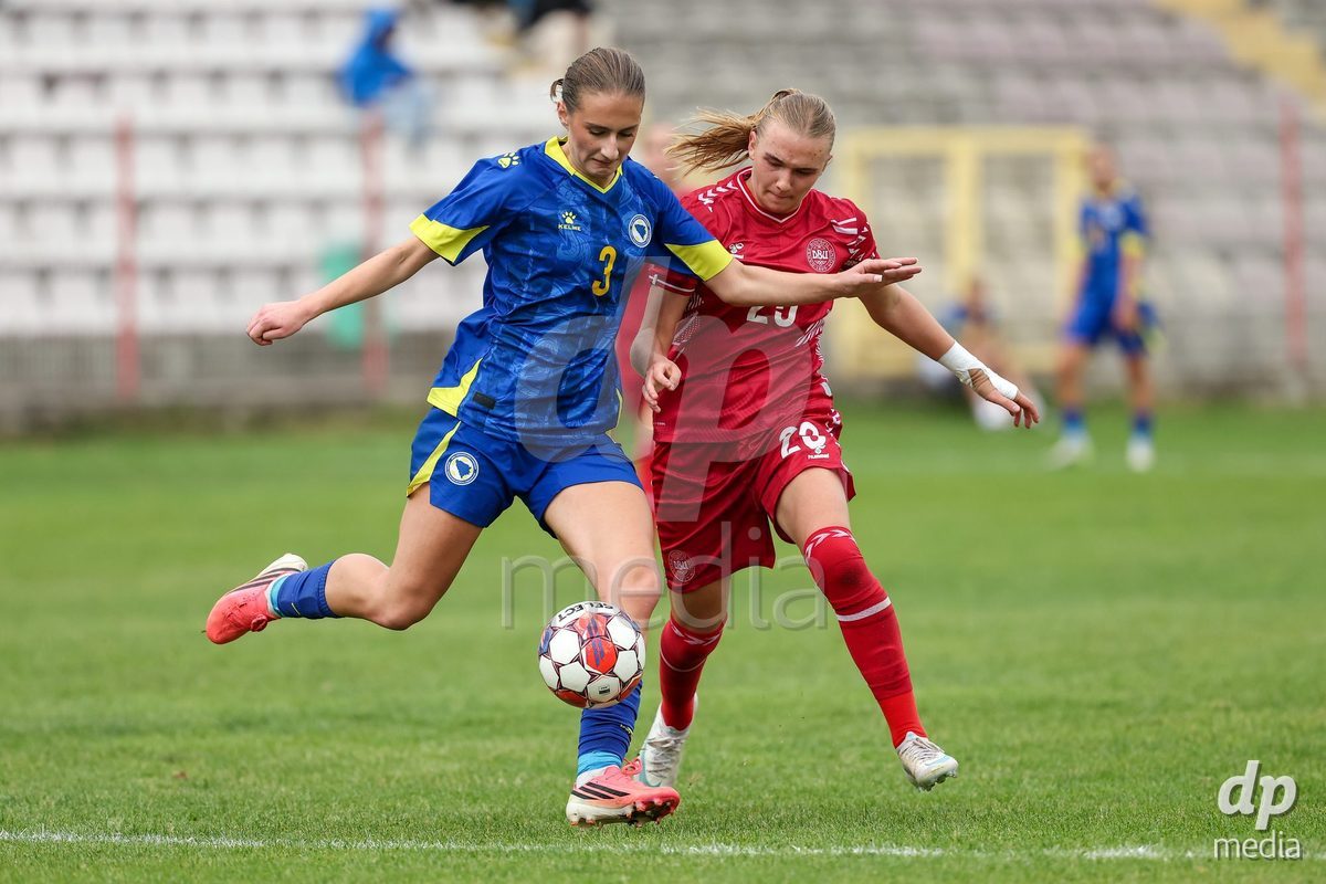 KAKANJ, BOSNIA AND HERZEGOVINA - OCTOBER 10: Ariana Hafizovic of Bosnia and Herzegovina and Nikoline Nielsen of Denmark during the UEFA Womens European Under-19 Qualifier match between Denmark and Bosnia and Herzegovina at Mladost Stadium on October 10, 2026 in Kakanj, Bosnia and Herzegovina. Photo: Armin Durgut/Pixsell/DP Media