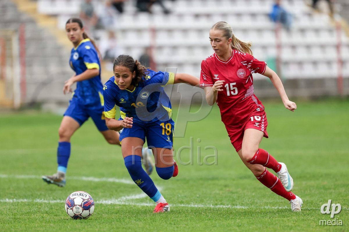 KAKANJ, BOSNIA AND HERZEGOVINA - OCTOBER 10: Hana Mesan of Bosnia and Herzegovina and Frederikke Ludvigsen of Denmark during the UEFA Womens European Under-19 Qualifier match between Denmark and Bosnia and Herzegovina at Mladost Stadium on October 10, 2026 in Kakanj, Bosnia and Herzegovina. Photo: Armin Durgut/Pixsell/DP Media