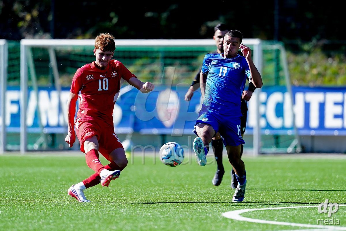 SCHAAN, LIECHTENSTEIN - OCTOBER 12: Eron Kele of Switzerland and Michael Yonatanov of Israel battle for the ball during the UEFA European Under-17 Qualifier match between Israel and Switzerland at LFV Campus Rheinwiese on October 12, 2026 in Schaan, Liechtenstein.