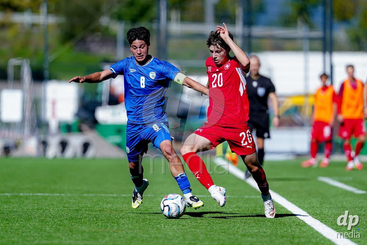 SCHAAN, LIECHTENSTEIN - OCTOBER 12: Loan Thommen of Switzerland and Noam Goldenberg of Israel battle for the ball during the UEFA European Under-17 Qualifier match between Israel and Switzerland at LFV Campus Rheinwiese on October 12, 2026 in Schaan, Liechtenstein.