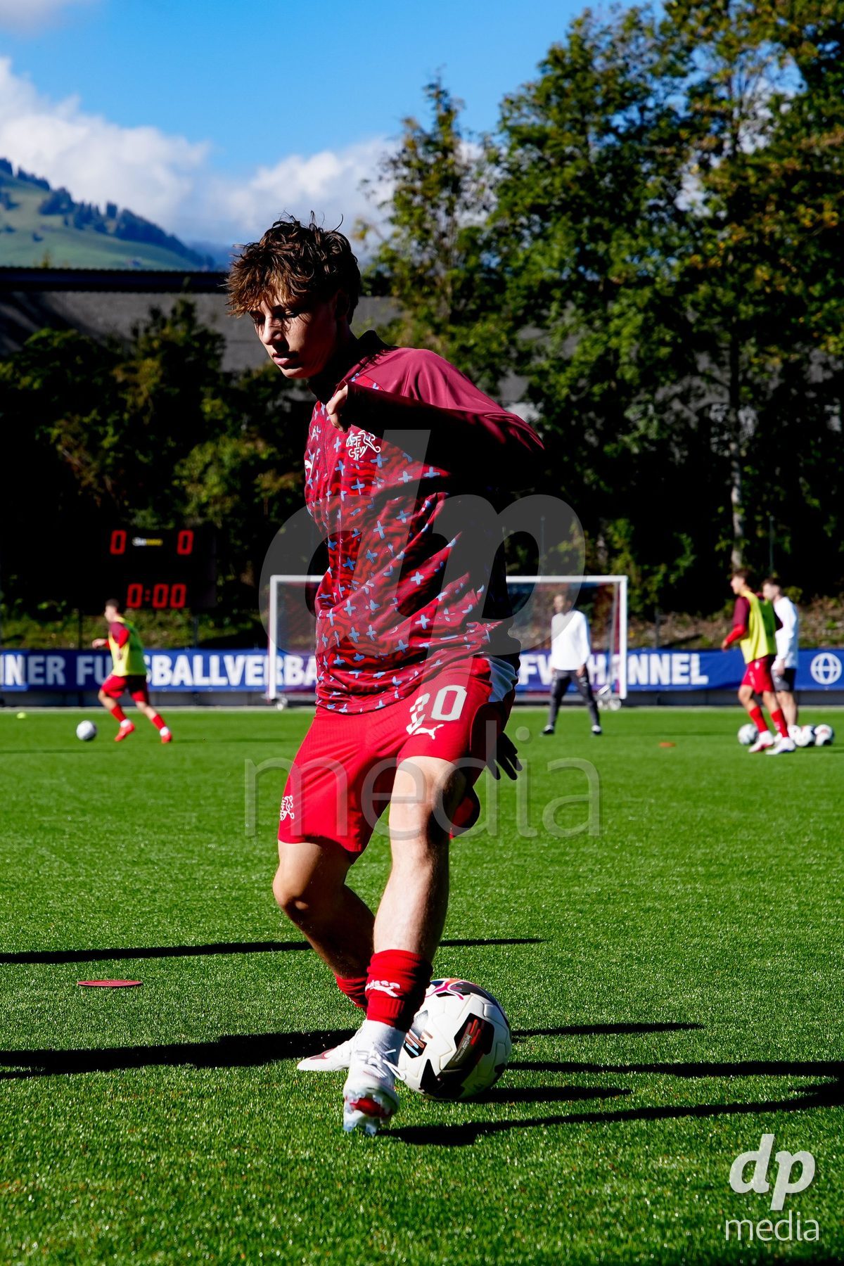 SCHAAN, LIECHTENSTEIN - OCTOBER 12: Players of Switzerland warming up during the UEFA European Under-17 Qualifier match between Israel and Switzerland at LFV Campus Rheinwiese on October 12, 2026 in Schaan, Liechtenstein.