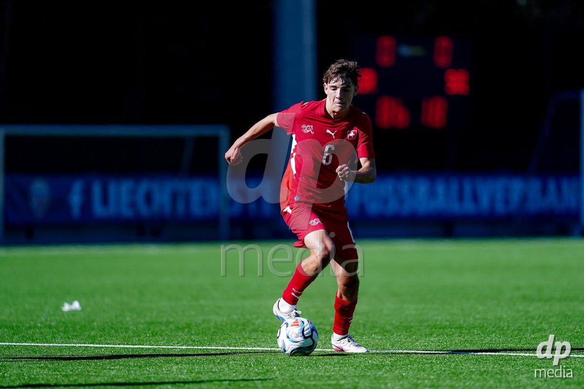 SCHAAN, LIECHTENSTEIN - OCTOBER 12: Niklas Zuger of Switzerland controls the ball during the UEFA European Under-17 Qualifier match between Israel and Switzerland at LFV Campus Rheinwiese on October 12, 2026 in Schaan, Liechtenstein.