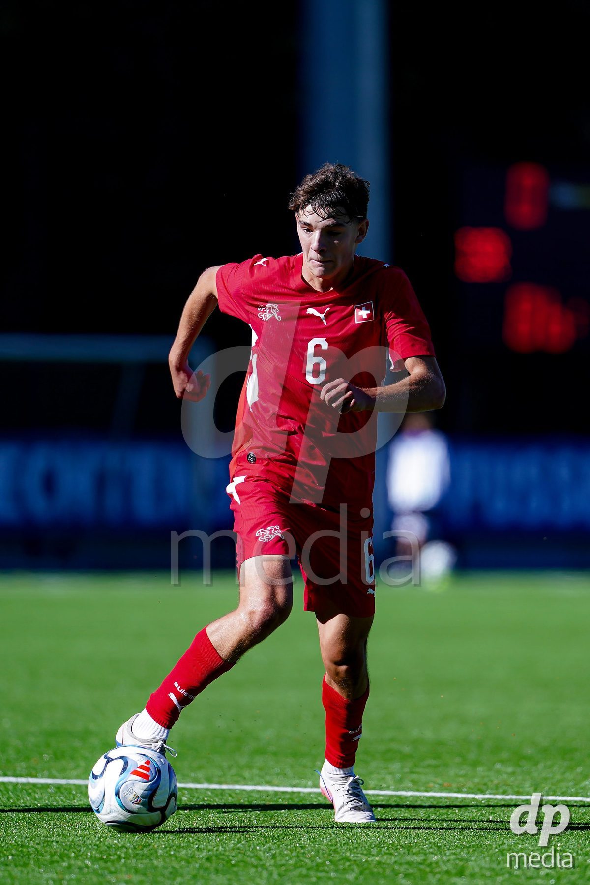 SCHAAN, LIECHTENSTEIN - OCTOBER 12: Niklas Zuger of Switzerland controls the ball during the UEFA European Under-17 Qualifier match between Israel and Switzerland at LFV Campus Rheinwiese on October 12, 2026 in Schaan, Liechtenstein.