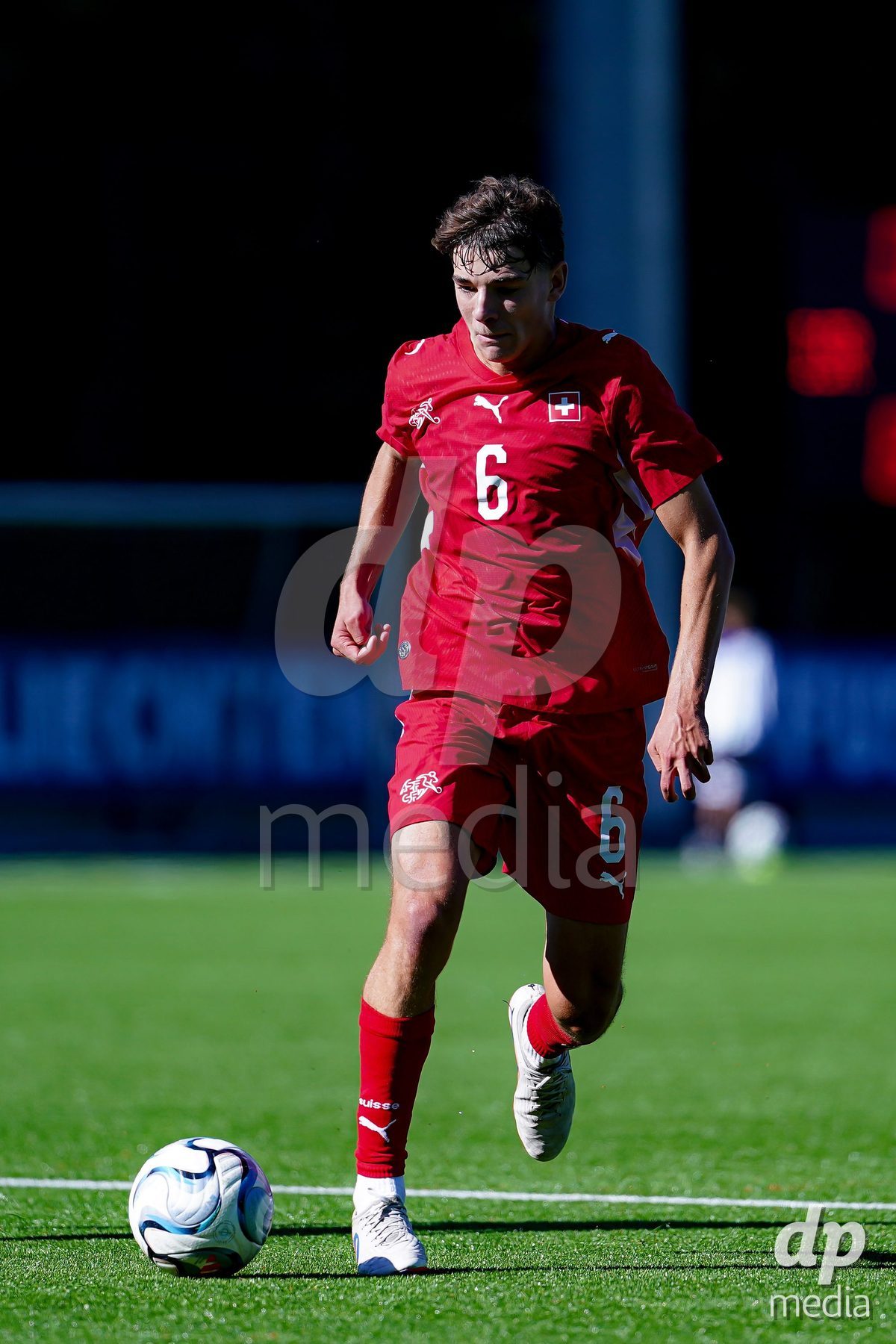 SCHAAN, LIECHTENSTEIN - OCTOBER 12: Niklas Zuger of Switzerland controls the ball during the UEFA European Under-17 Qualifier match between Israel and Switzerland at LFV Campus Rheinwiese on October 12, 2026 in Schaan, Liechtenstein.