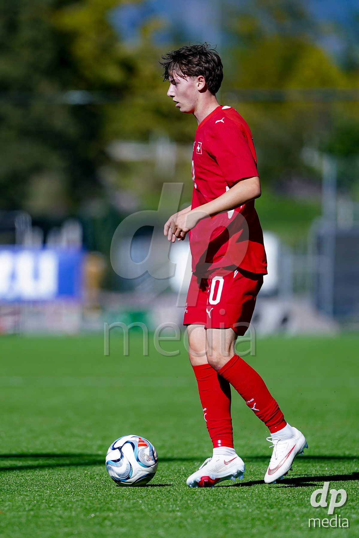 SCHAAN, LIECHTENSTEIN - OCTOBER 12: Loan Thommen of Switzerland controls the ball during the UEFA European Under-17 Qualifier match between Israel and Switzerland at LFV Campus Rheinwiese on October 12, 2026 in Schaan, Liechtenstein.