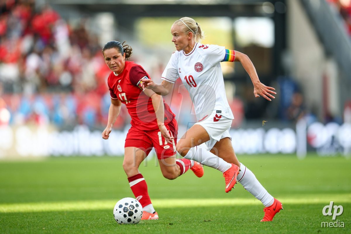 TORONTO, CANADA - OCTOBER 12: Pernille Harder of Denmark (R) and Jessie Fleming of Canada (L) battle for the ball (duel) during the International Friendly match between Canada and Denmark at BMO Field on October 12, 2026 in Toronto, Canada.