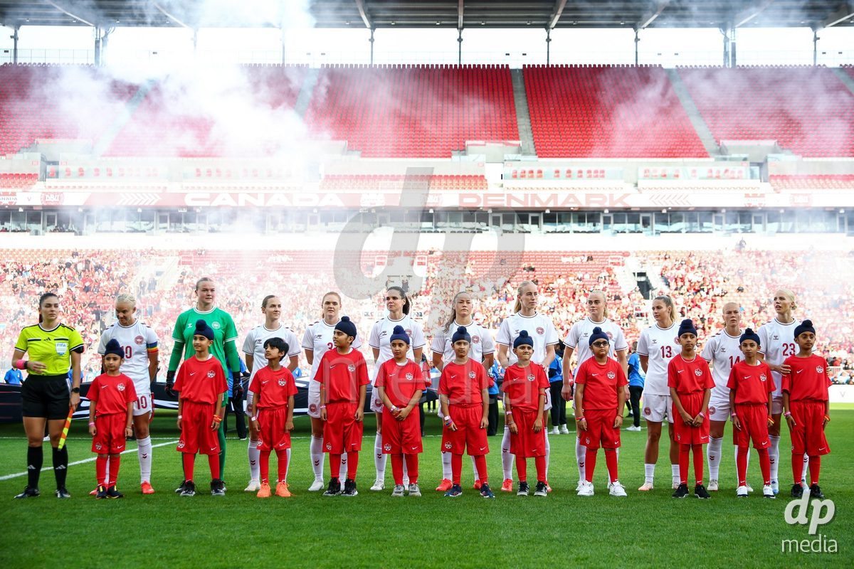 TORONTO, CANADA - OCTOBER 12: Players of Denmark during the national anthem prior to the International Friendly match between Canada and Denmark at BMO Field on October 12, 2026 in Toronto, Canada.