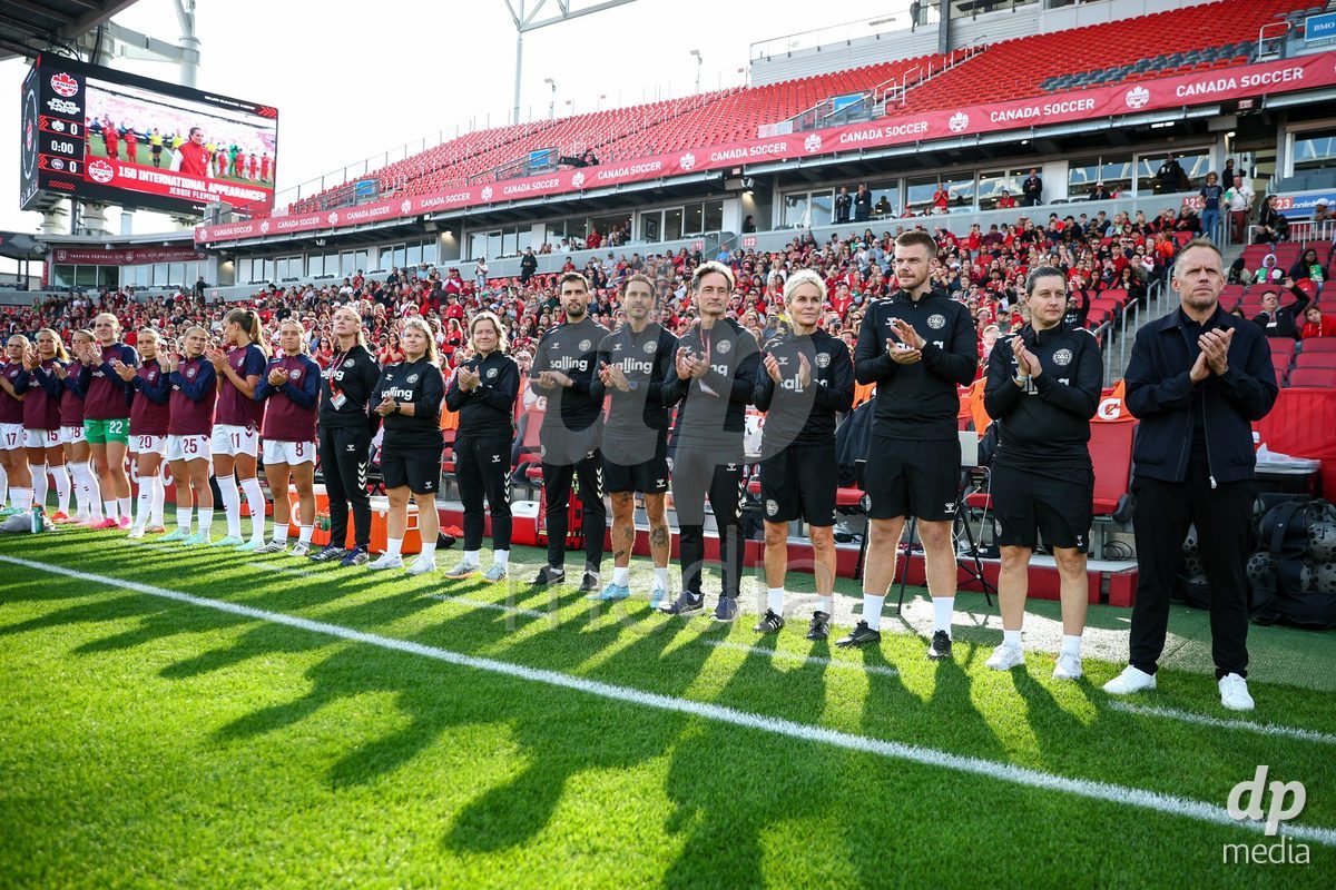 TORONTO, CANADA - OCTOBER 12: Players and staff members of Denmark during the national anthem prior to the International Friendly match between Canada and Denmark at BMO Field on October 12, 2026 in Toronto, Canada.