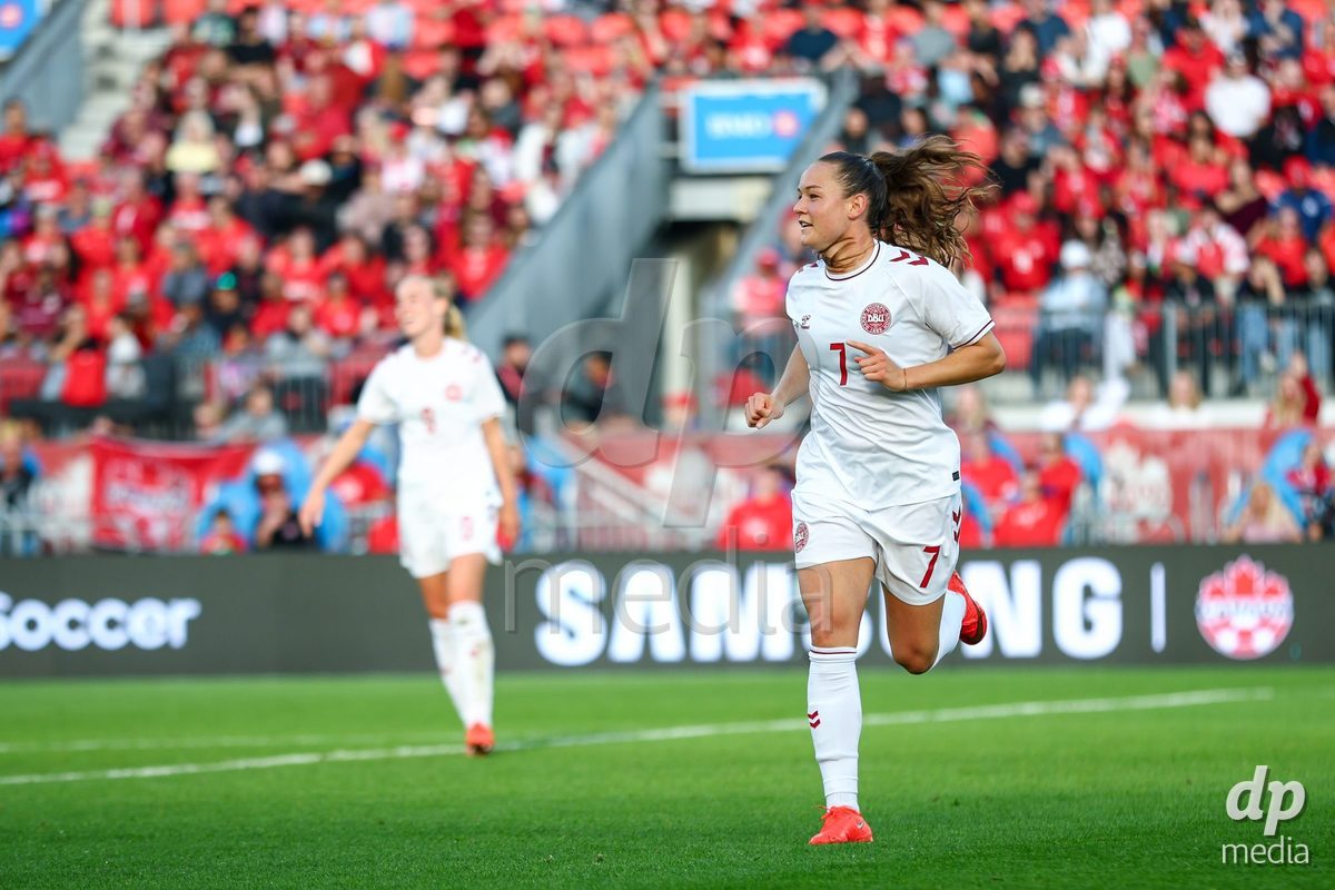 TORONTO, CANADA - OCTOBER 12: Janni Thomsen of Denmark celebrates the fourth team goal during the International Friendly match between Canada and Denmark at BMO Field on October 12, 2026 in Toronto, Canada.
