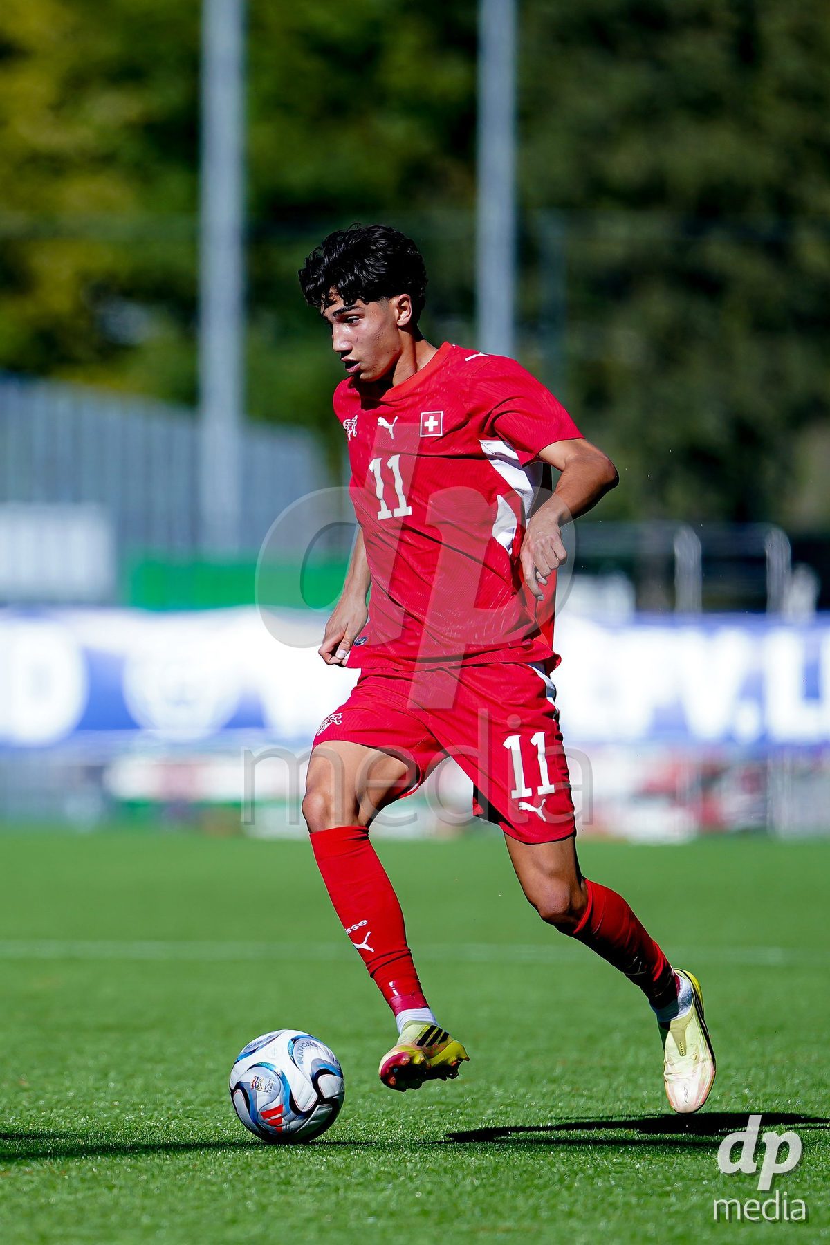 SCHAAN, LIECHTENSTEIN - OCTOBER 12: Kaan Arslan of Switzerland controls the ball during the UEFA European Under-17 Qualifier match between Israel and Switzerland at LFV Campus Rheinwiese on October 12, 2026 in Schaan, Liechtenstein.