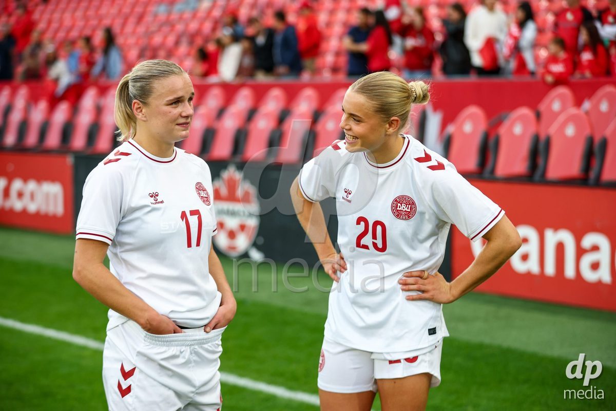 TORONTO, CANADA - OCTOBER 12: Anna Walter of Denmark and Cornelia Kramer of Denmark after the victory during the International Friendly match between Canada and Denmark at BMO Field on October 12, 2026 in Toronto, Canada.