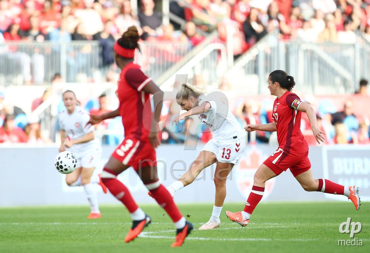 TORONTO, CANADA - OCTOBER 12: Olivia Holdt of Denmark kicks the ball to score her first goal from half during the International Friendly match against Canada at BMO Field on October 12, 2026 in Toronto, Canada.
