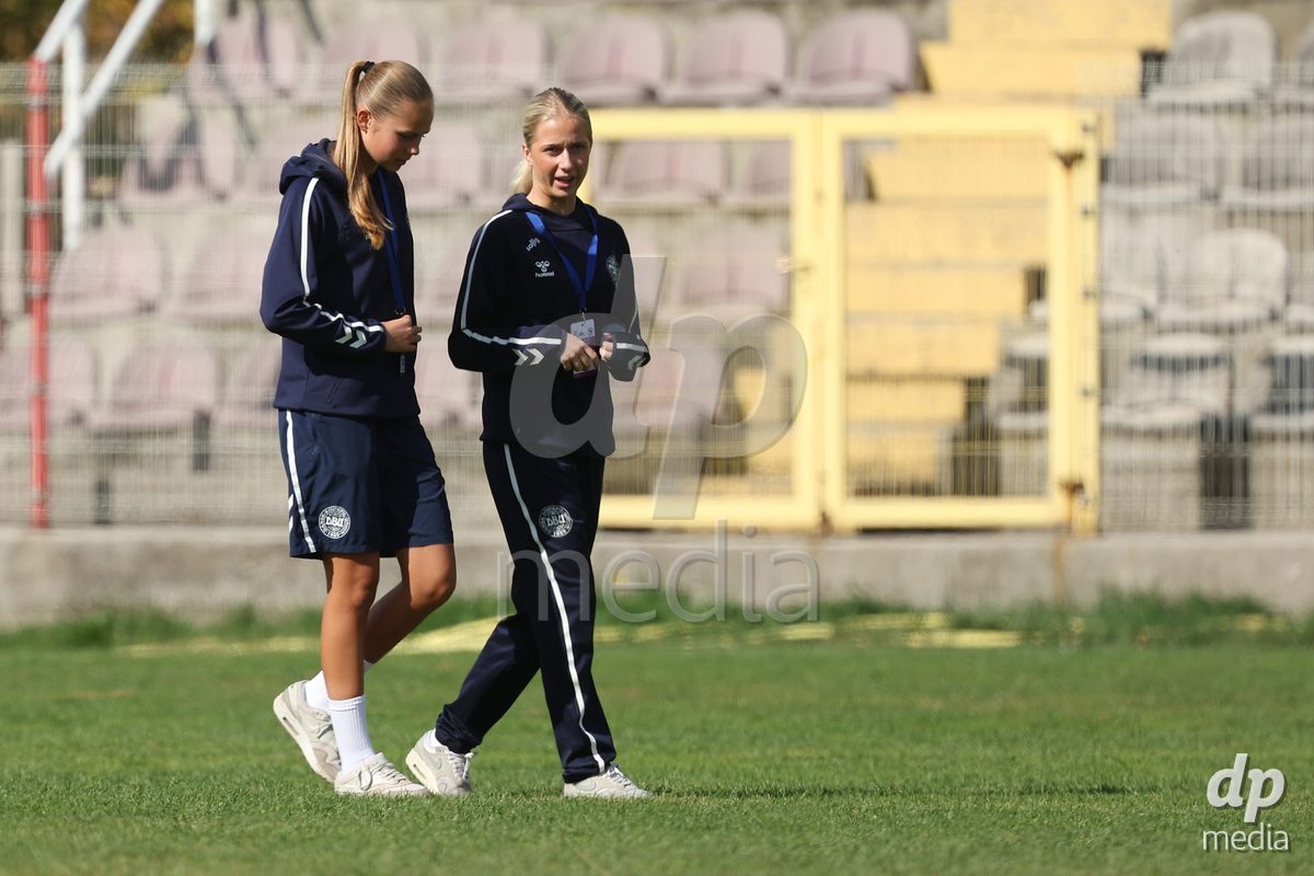 KAKANJ, BOSNIA AND HERZEGOVINA - OCTOBER 13: Sarah Lindorff Vinther of Denmark and Frederikke Ludvigsen of Denmark inspects the pitch prior to the UEFA Womens European Under-19 Qualifier match between Denmark and Switzerland at Mladost Stadium on October 13, 2026 in Kakanj, Bosnia and Herzegovina. Photo: Armin Durgut/Pixsell/DP Media