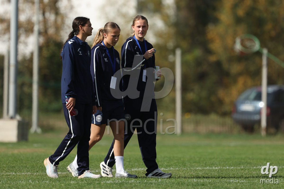 KAKANJ, BOSNIA AND HERZEGOVINA - OCTOBER 13: Mila Bischoff of Denmark, Caroline Ahle of Denmark and Andrea Thierry of Denmark inspects the pitch prior to the UEFA Womens European Under-19 Qualifier match between Denmark and Switzerland at Mladost Stadium on October 13, 2026 in Kakanj, Bosnia and Herzegovina. Photo: Armin Durgut/Pixsell/DP Media