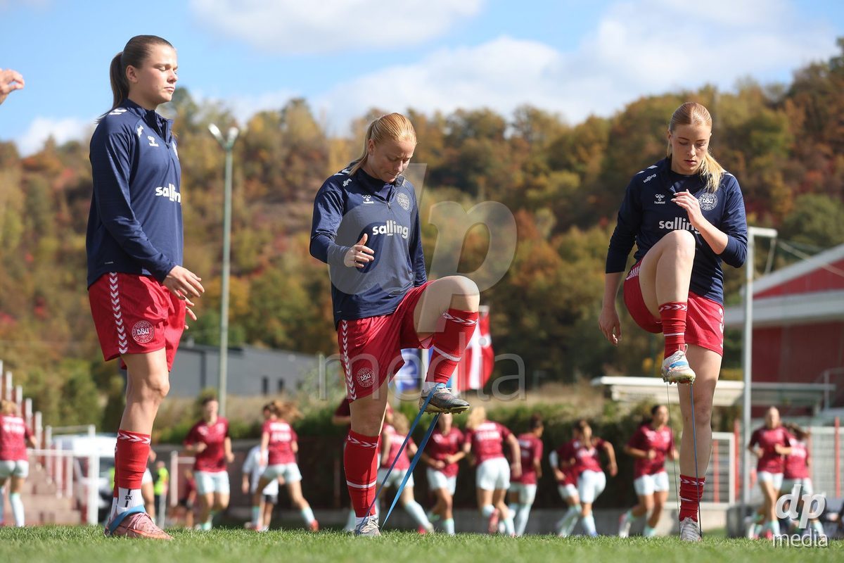 KAKANJ, BOSNIA AND HERZEGOVINA - OCTOBER 13: Nicoline Jorgensen Klintskov of Denmark, Alberte Mott of Denmark and Asta Kynde of Denmark warms up prior to the UEFA Womens European Under-19 Qualifier match between Denmark and Switzerland at Mladost Stadium on October 13, 2026 in Kakanj, Bosnia and Herzegovina. Photo: Armin Durgut/Pixsell/DP Media