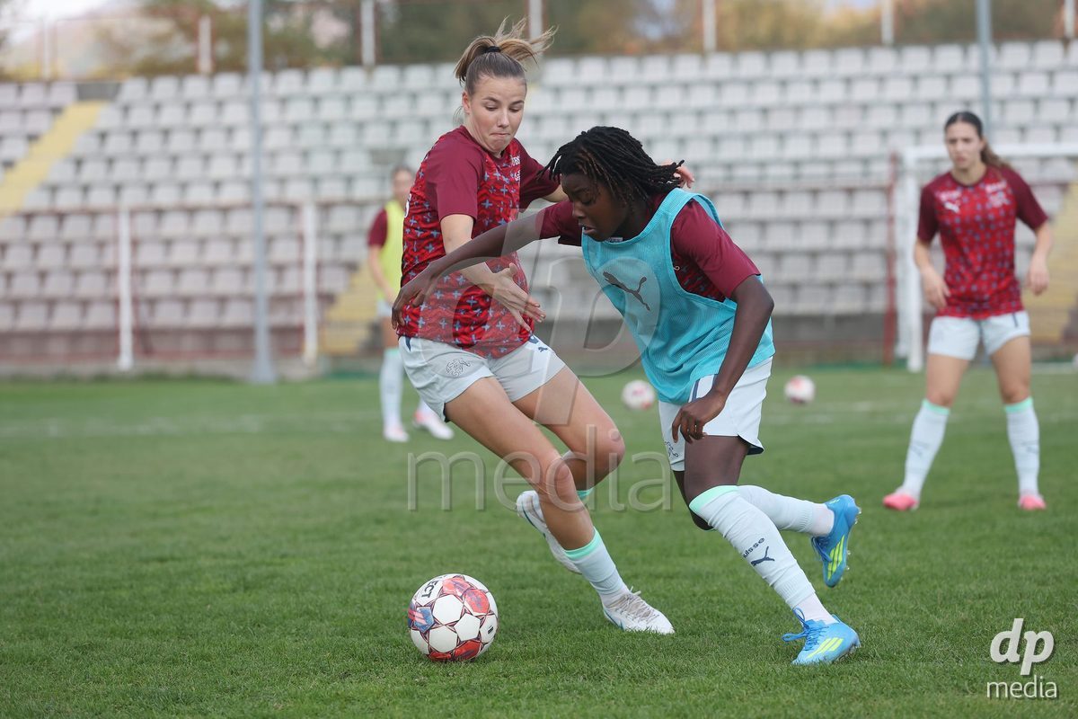 KAKANJ, BOSNIA AND HERZEGOVINA - OCTOBER 13: Giulia Looser of Switzerland and Garance Nein of Switzerland warms up prior to the UEFA Womens European Under-19 Qualifier match between Denmark and Switzerland at Mladost Stadium on October 13, 2026 in Kakanj, Bosnia and Herzegovina. Photo: Armin Durgut/Pixsell/DP Media