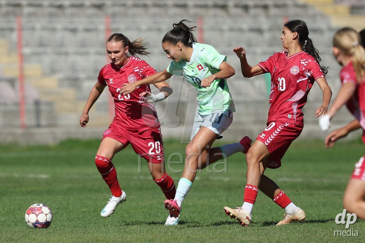 KAKANJ, BOSNIA AND HERZEGOVINA - OCTOBER 13: Nikoline Nielsen of Denmark, Olivia Edelmann of Switzerland and Mila Bischoff of Denmark during the UEFA Womens European Under-19 Qualifier match between Denmark and Switzerland at Mladost Stadium on October 13, 2026 in Kakanj, Bosnia and Herzegovina. Photo: Armin Durgut/Pixsell/DP Media