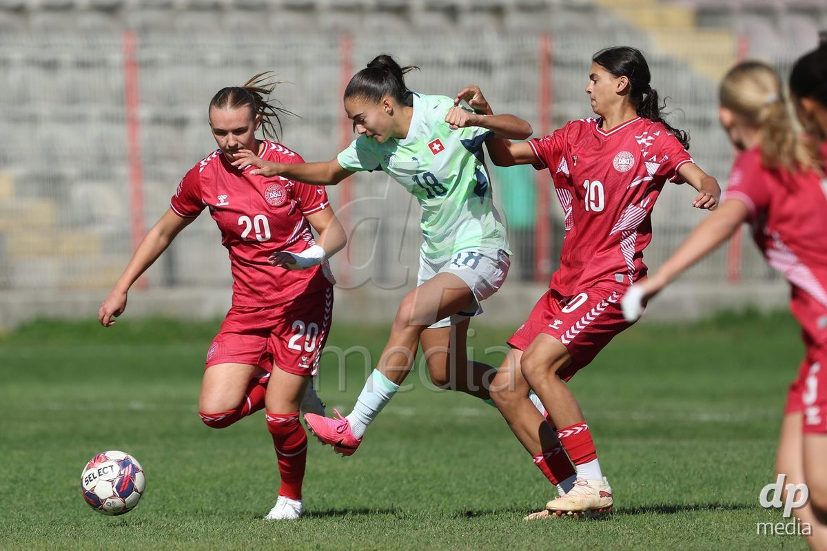 KAKANJ, BOSNIA AND HERZEGOVINA - OCTOBER 13: Nikoline Nielsen of Denmark, Olivia Edelmann of Switzerland and Mila Bischoff of Denmark during the UEFA Womens European Under-19 Qualifier match between Denmark and Switzerland at Mladost Stadium on October 13, 2026 in Kakanj, Bosnia and Herzegovina. Photo: Armin Durgut/Pixsell/DP Media