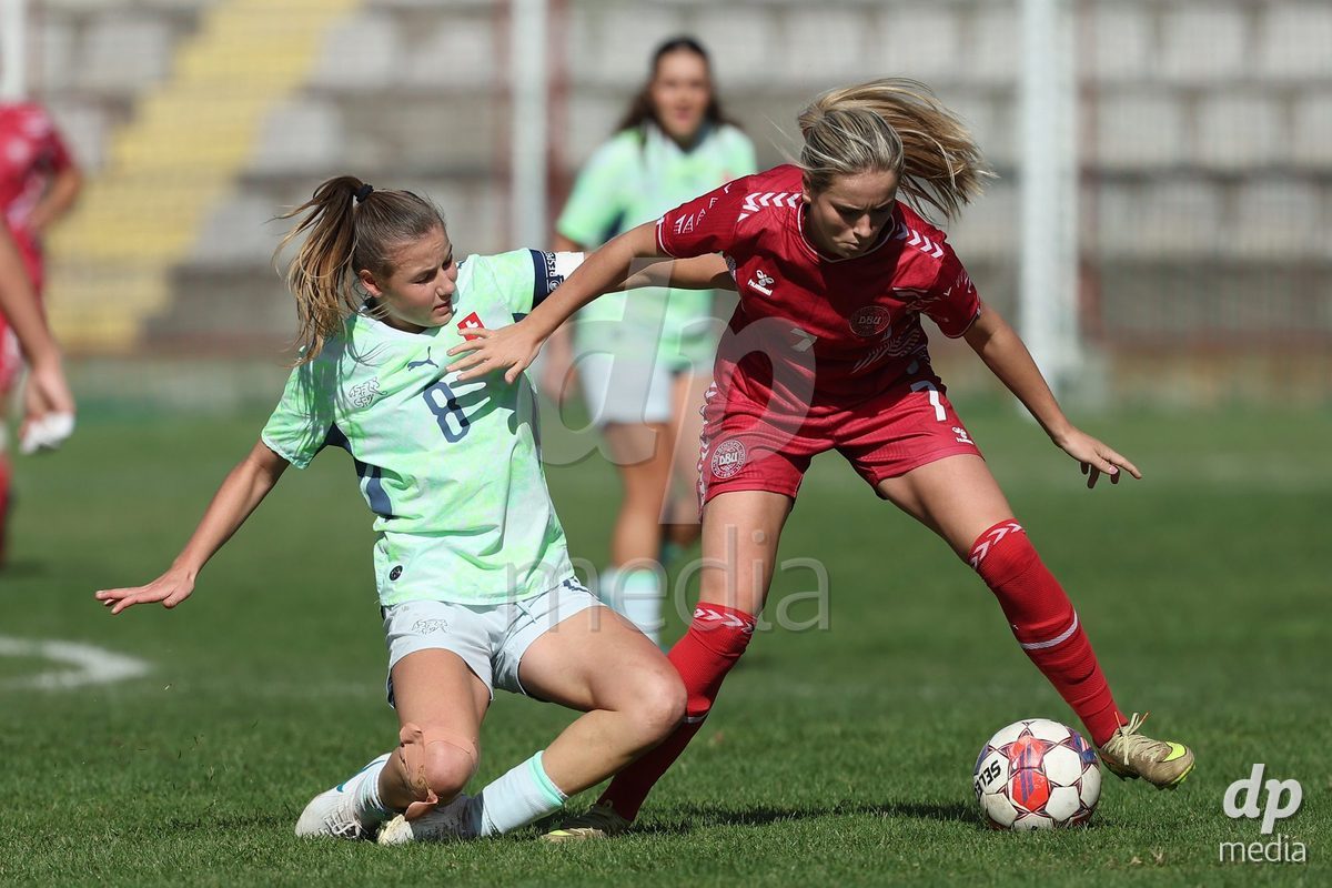 KAKANJ, BOSNIA AND HERZEGOVINA - OCTOBER 13: Giulia Looser of Switzerland and Nellie Mulvad Gejel of Denmark during the UEFA Womens European Under-19 Qualifier match between Denmark and Switzerland at Mladost Stadium on October 13, 2026 in Kakanj, Bosnia and Herzegovina. Photo: Armin Durgut/Pixsell/DP Media