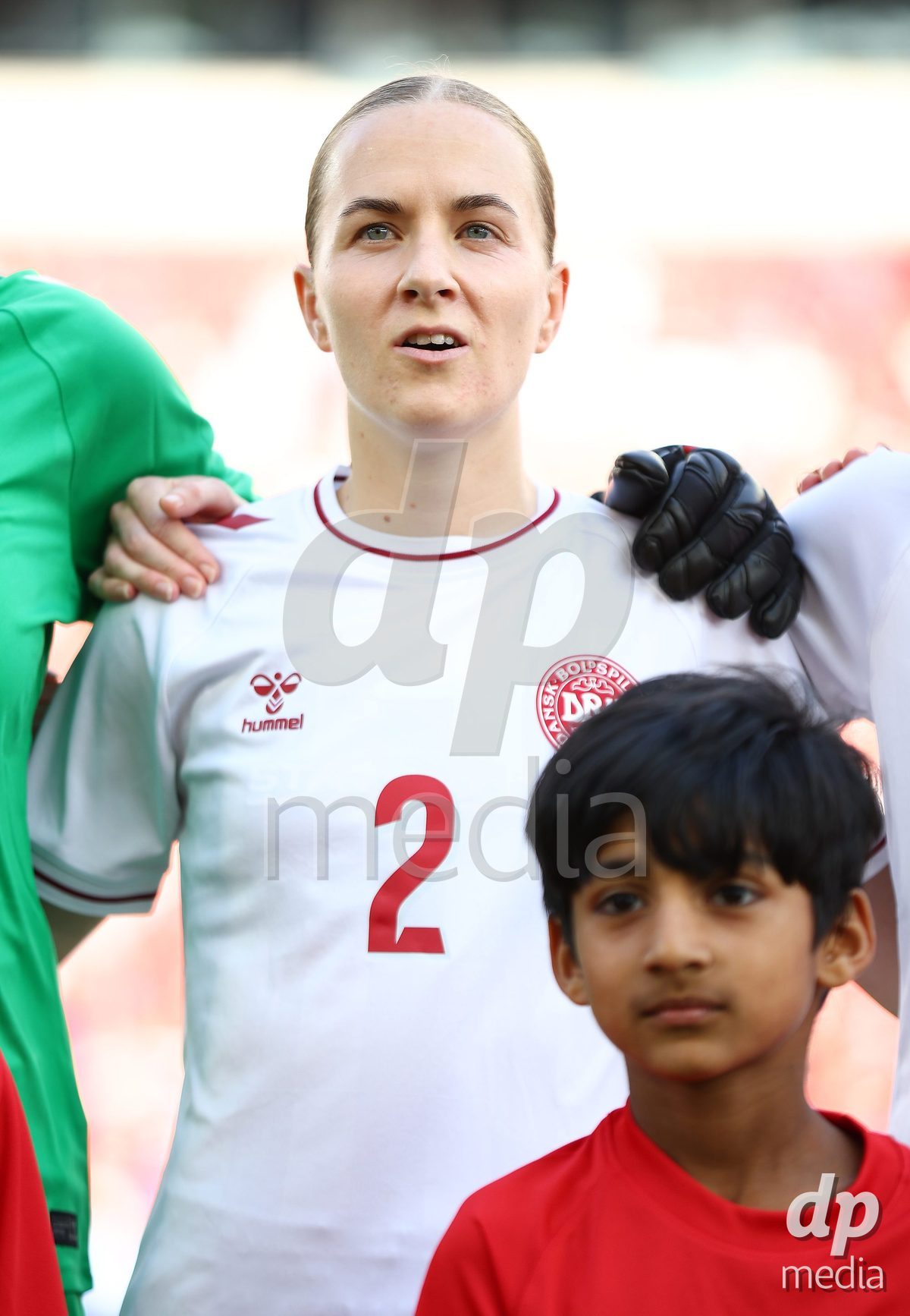TORONTO, CANADA - OCTOBER 12: Sara Thrige of Denmark stands for the national anthem before the International Friendly match against Canada at BMO Field on October 12, 2026 in Toronto, Canada.