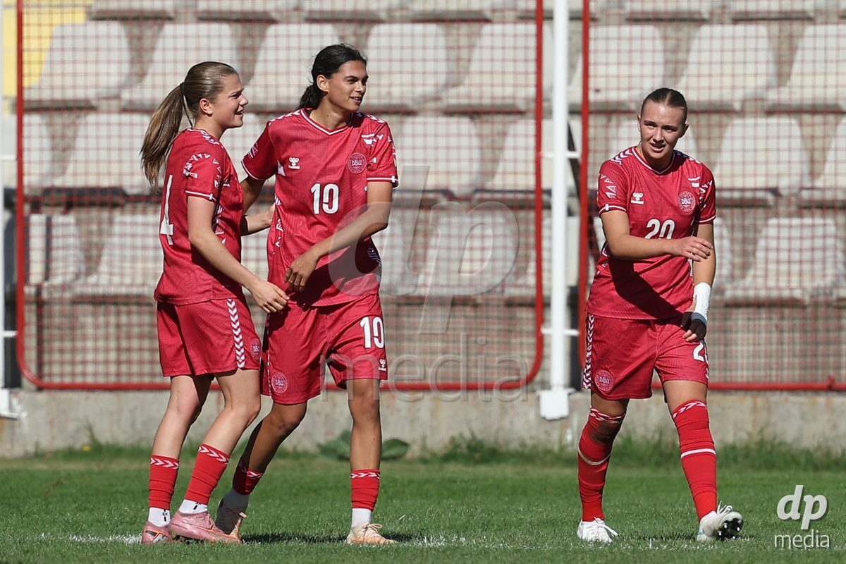 KAKANJ, BOSNIA AND HERZEGOVINA - OCTOBER 13: Nicoline Jorgensen Klintskov of Denmark, Mila Bischoff of Denmark and Nikoline Nielsen of Denmark celebrate after Mila Bischoff of Denmark score a goal for 2:1 the UEFA Womens European Under-19 Qualifier match between Denmark and Switzerland at Mladost Stadium on October 13, 2026 in Kakanj, Bosnia and Herzegovina. Photo: Armin Durgut/Pixsell/DP Media