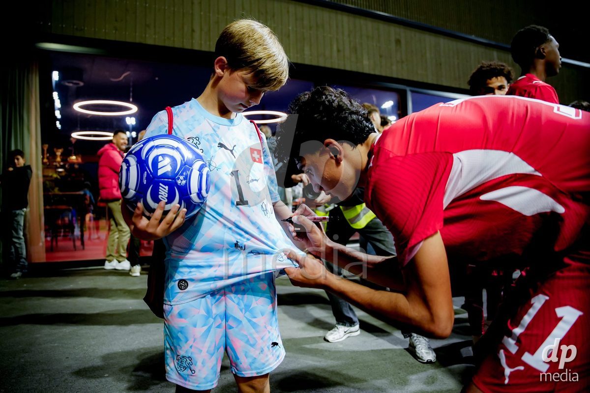 SCHAAN, LIECHTENSTEIN - OCTOBER 15: Players of Switzerland with fans after winning the UEFA European Under-17 Qualifier match between Switzerland and Liechtenstein at LFV Campus Rheinwiese on October 15, 2026 in Schaan, Liechtenstein.