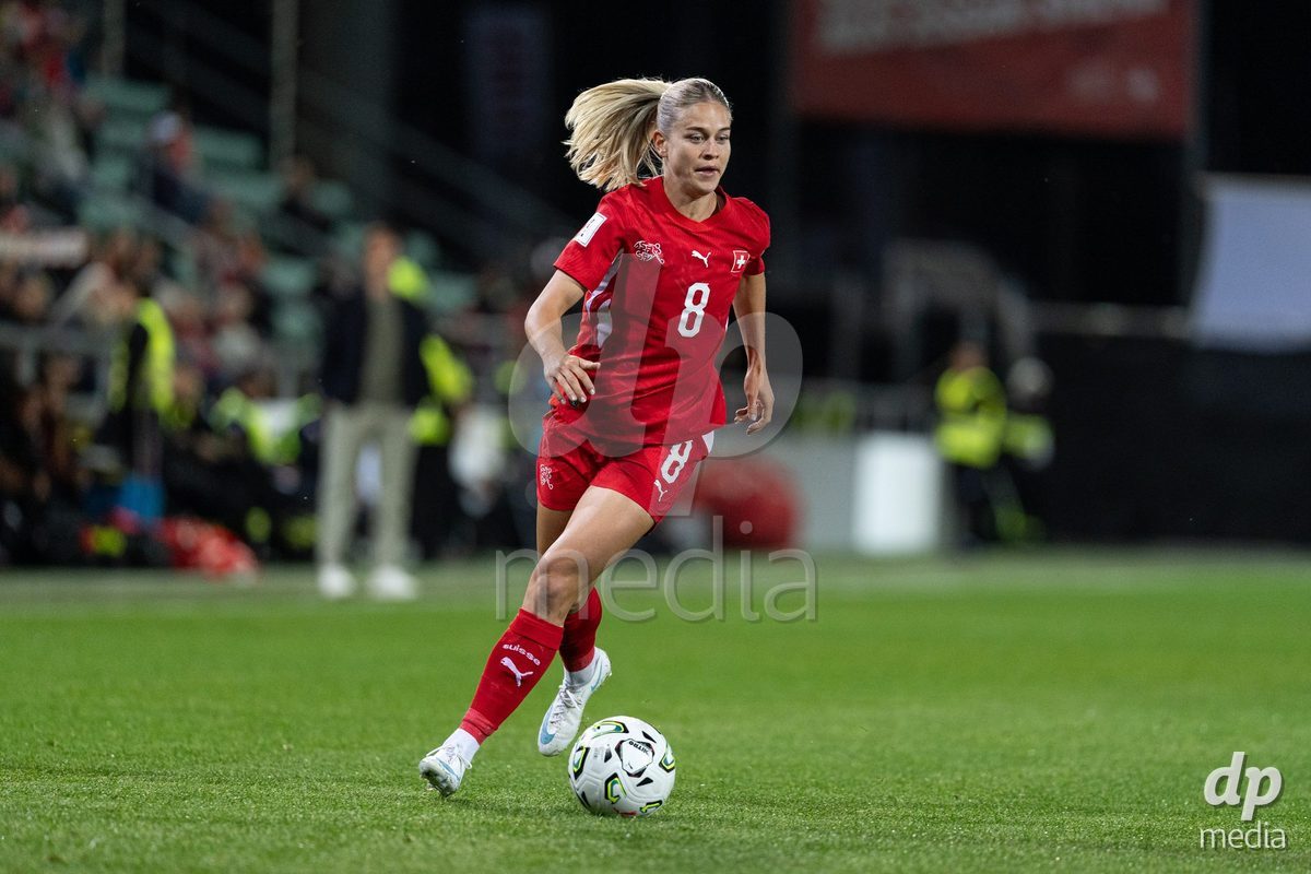 SION, SWITZERLAND, OCTOBER 13 : Nadine Riesen of Switzerland runs with the ball during the FIFA Women's World Cup 2027 Women's European Qualifiers Play-offs game between Switzerland and Israel at Stade de Tourbillon on October 13, 2026 in Sion, Switzerland.