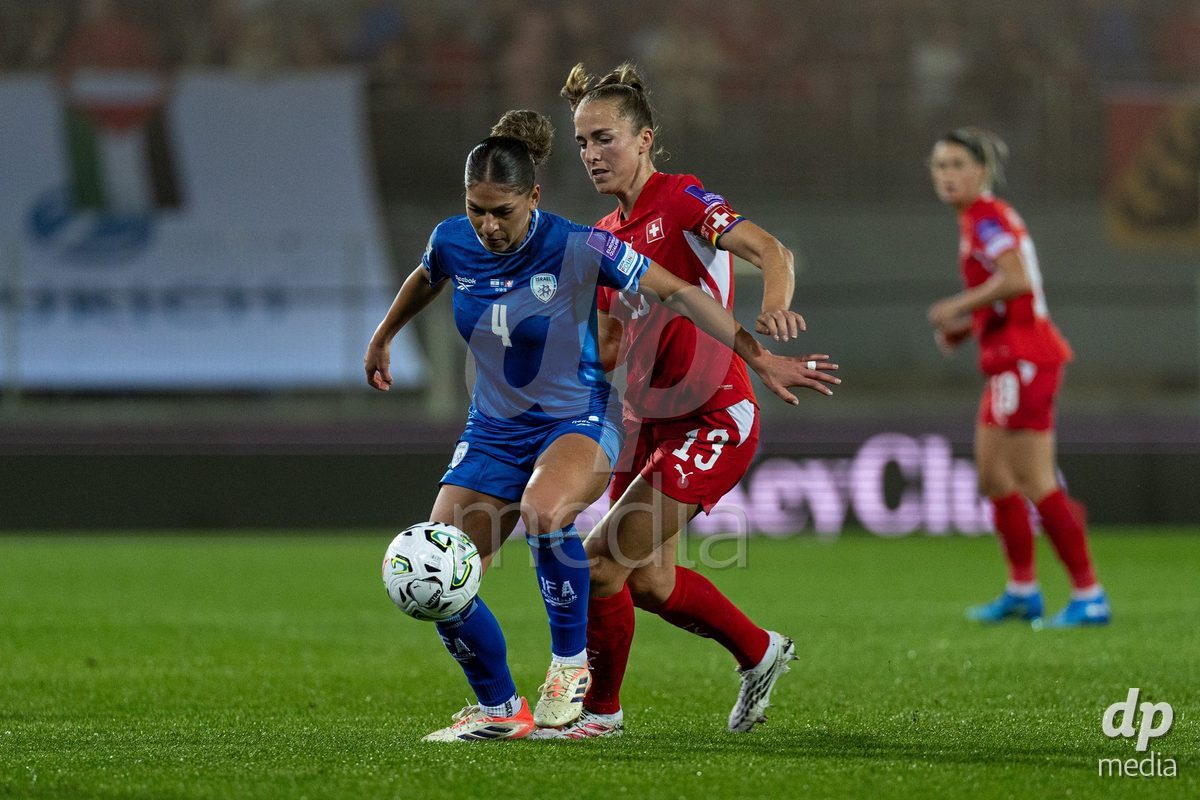 SION, SWITZERLAND, OCTOBER 13 : Duel between Itaf Alkisi of Israel and Lia Wälti of Switzerland during the FIFA Women's World Cup 2027 Women's European Qualifiers Play-offs game between Switzerland and Israel at Stade de Tourbillon on October 13, 2026 in Sion, Switzerland.