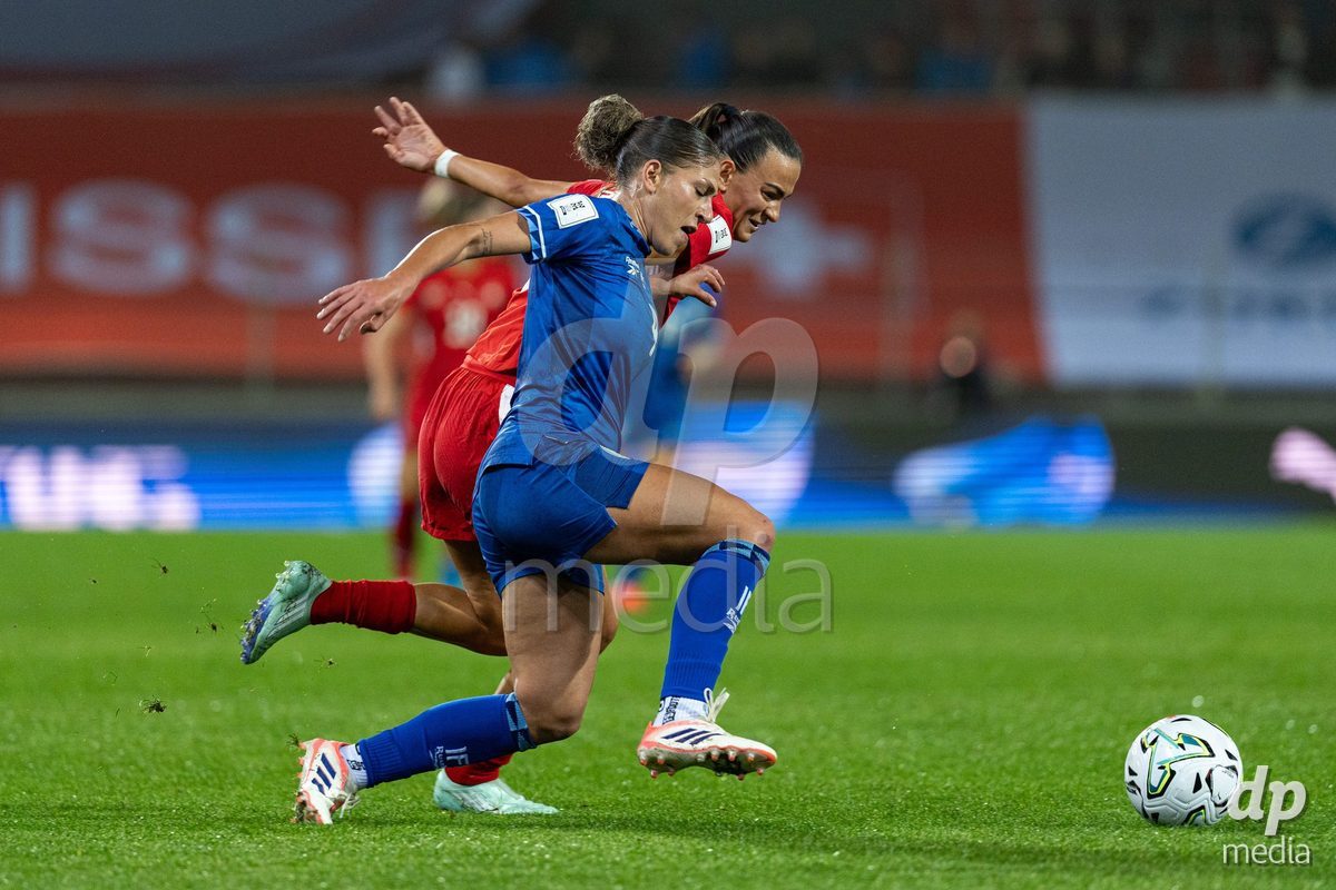 SION, SWITZERLAND, OCTOBER 13 : Duel between Itaf Alkisi of Israel and Riola Xhemaili of Switzerland during the FIFA Women's World Cup 2027 Women's European Qualifiers Play-offs game between Switzerland and Israel at Stade de Tourbillon on October 13, 2026 in Sion, Switzerland.