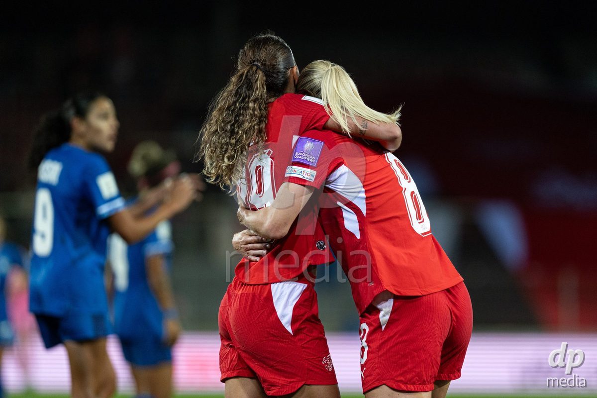 SION, SWITZERLAND, OCTOBER 13 : Iman Beney of Switzerland and Nadine Riesen of Switzerland celebrate the goal (1-0) during the FIFA Women's World Cup 2027 Women's European Qualifiers Play-offs game between Switzerland and Israel at Stade de Tourbillon on October 13, 2026 in Sion, Switzerland.