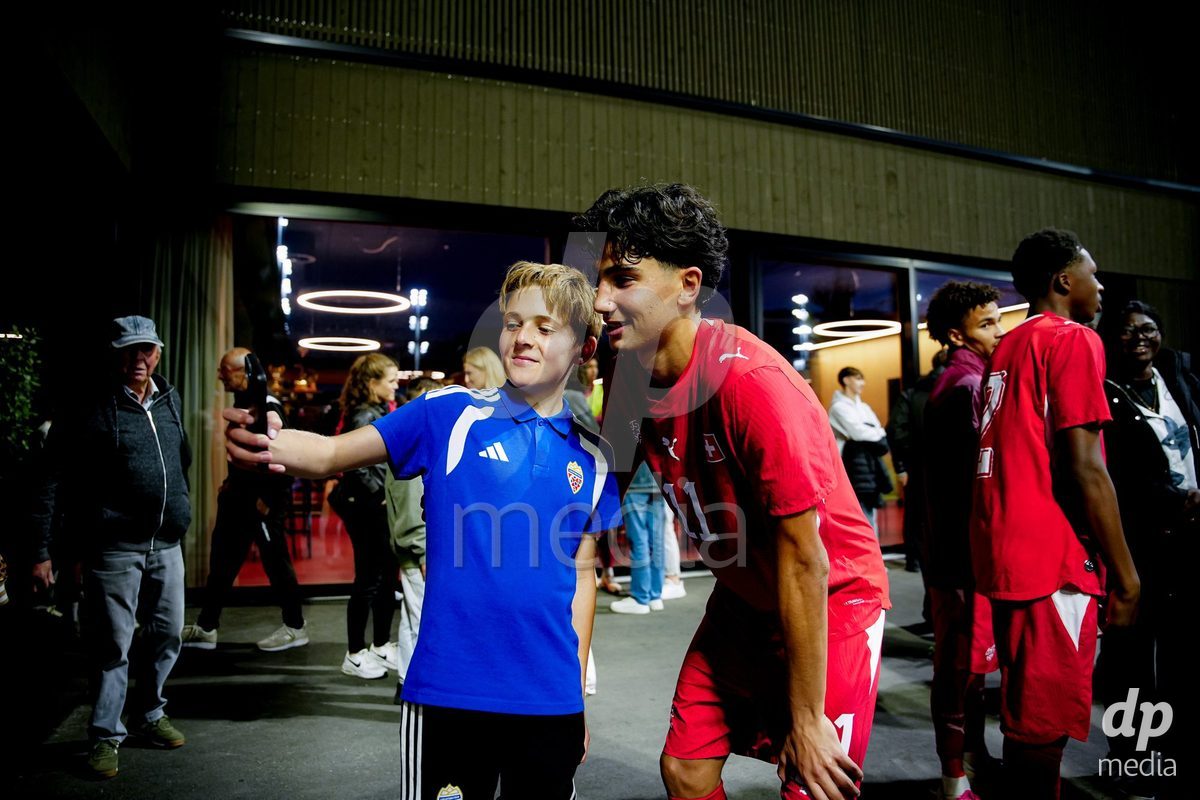 SCHAAN, LIECHTENSTEIN - OCTOBER 15: Players of Switzerland with fans after winning the UEFA European Under-17 Qualifier match between Switzerland and Liechtenstein at LFV Campus Rheinwiese on October 15, 2026 in Schaan, Liechtenstein.