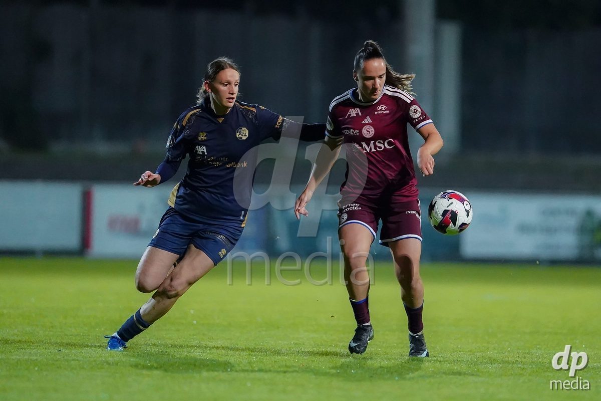 GENEVA, SWITZERLAND - OCTOBER 16: Magdalena Sobal of Servette FC Chenois Feminin and Lena Walti of FC Luzern battle for the ball during the AXA Women's Super League match between Servette FC Chenois Feminin and FC Luzern at Stade de Trois-Chene on October 16, 2026 in Geneva, Switzerland.