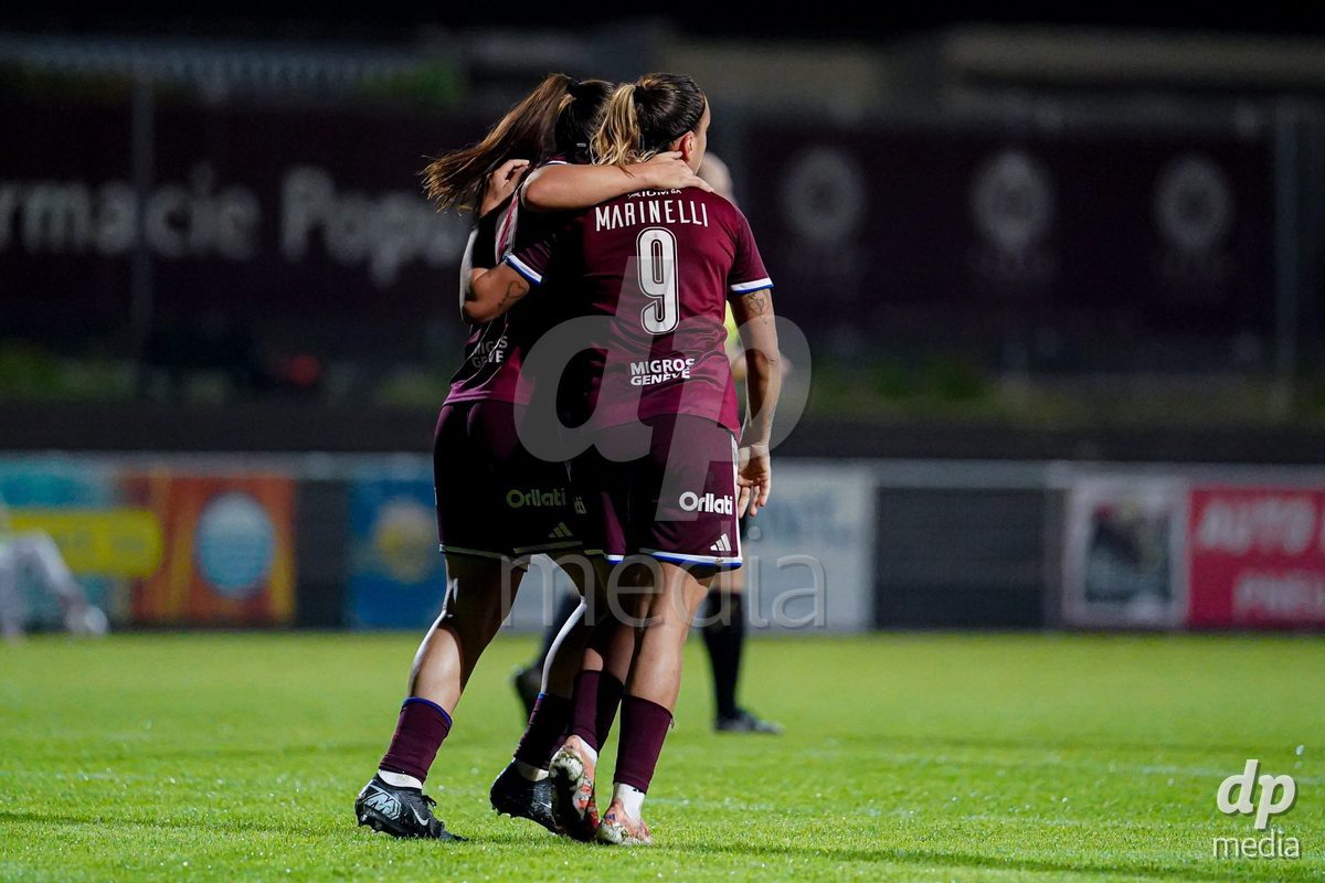 GENEVA, SWITZERLAND - OCTOBER 16: Gloria Marinelli of Servette FC Chenois Feminin celebrating with team after scoring teams third goal during the AXA Women's Super League match between Servette FC Chenois Feminin and FC Luzern at Stade de Trois-Chene on October 16, 2026 in Geneva, Switzerland.