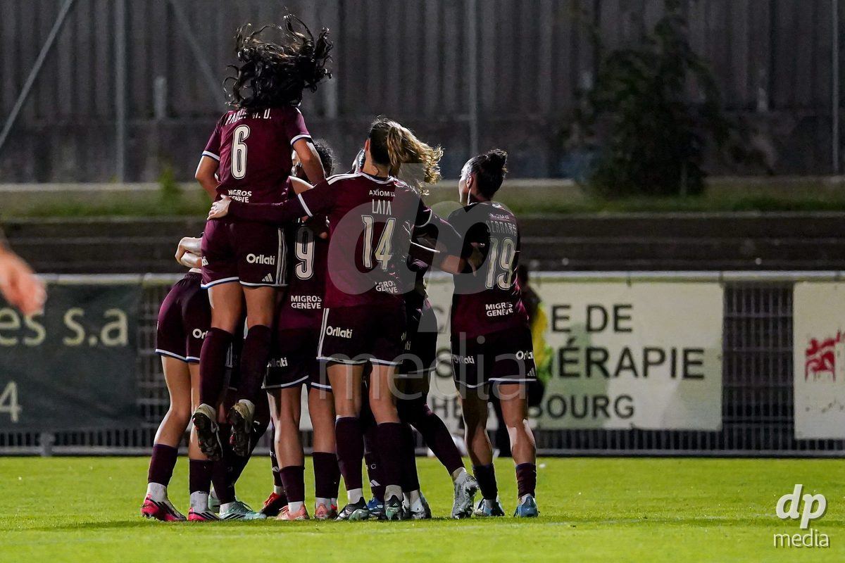 GENEVA, SWITZERLAND - OCTOBER 16: Mickaella Cardia of Servette FC Chenois Feminin celebrating with team after scoring teams second goal during the AXA Women's Super League match between Servette FC Chenois Feminin and FC Luzern at Stade de Trois-Chene on October 16, 2026 in Geneva, Switzerland.