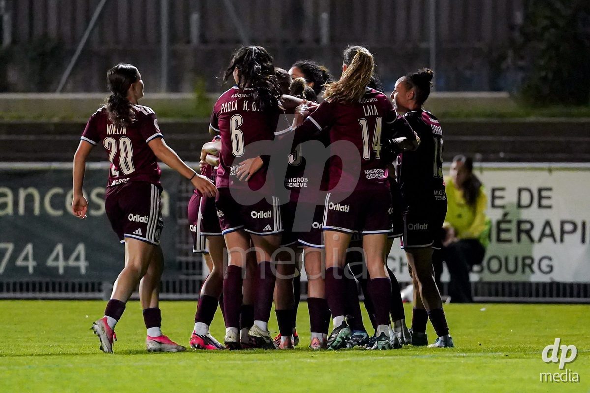 GENEVA, SWITZERLAND - OCTOBER 16: Mickaella Cardia of Servette FC Chenois Feminin celebrating with team after scoring teams second goal during the AXA Women's Super League match between Servette FC Chenois Feminin and FC Luzern at Stade de Trois-Chene on October 16, 2026 in Geneva, Switzerland.