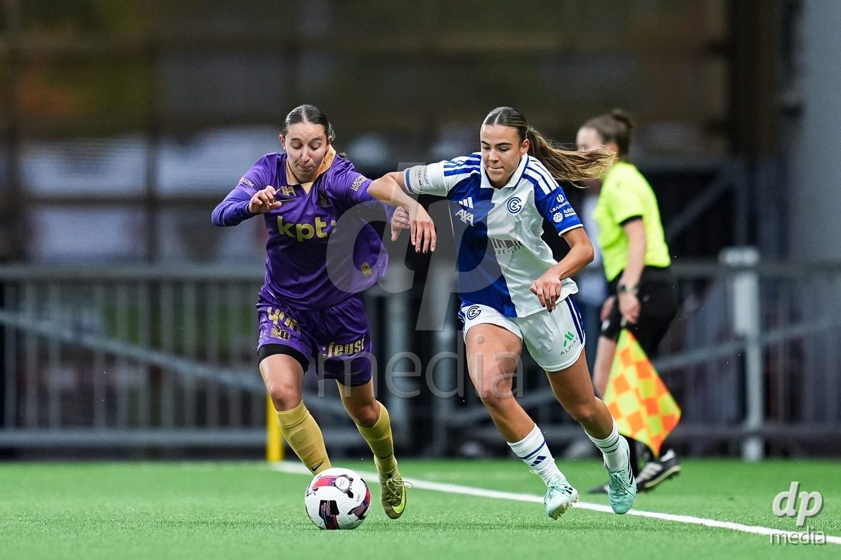 BERN, SWITZERLAND - OCTOBER 17: Malaurie Granges of YB Frauen (L) and Emma Egli of Grasshopper Club Zurich (R) battle for the ball (duel)  during the AXA Women's Super League match between BSC YB Frauen and GC Frauenfussball at Wankdorf Stadion on October 17, 2026 in Bern, Switzerland.