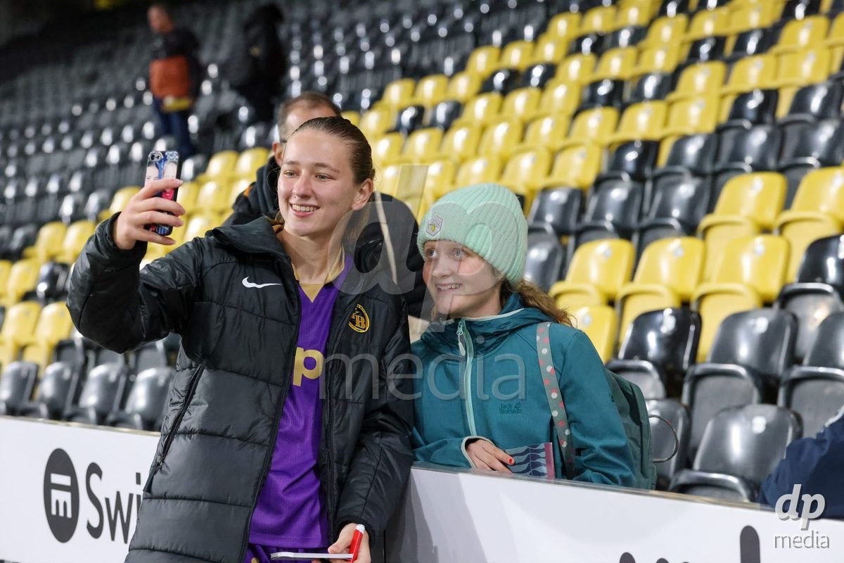 BERN, SWITZERLAND - OCTOBER 17: Players of YB Frauen with fans after their victory during the AXA Women's Super League match between BSC YB Frauen and GC Frauenfussball at Wankdorf Stadion on October 17, 2026 in Bern, Switzerland.