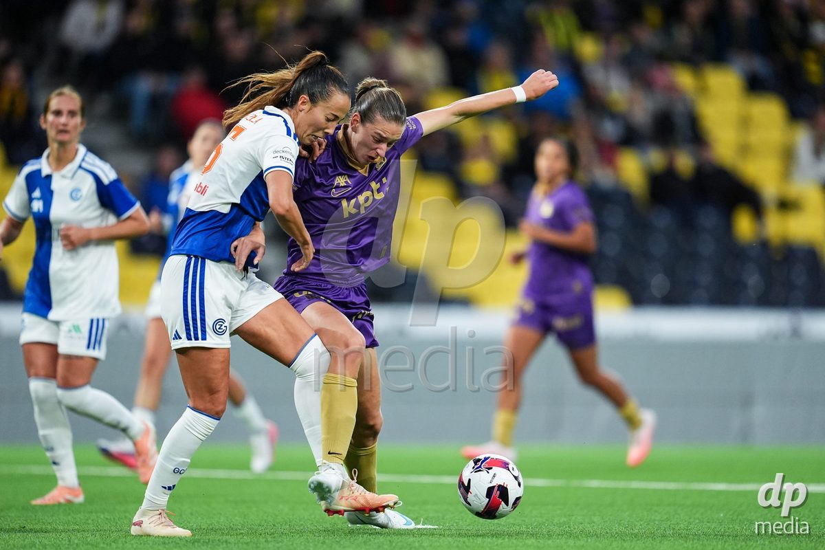 BERN, SWITZERLAND - OCTOBER 17: Marta Cazalla Garcia of GC Frauenfussball (L) and Wibke Meister of BSC YB Frauen (R) battle for the ball (duel)  during the AXA Women's Super League match between BSC YB Frauen and GC Frauenfussball at Wankdorf Stadion on October 17, 2026 in Bern, Switzerland.