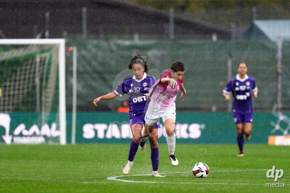 YVERDON-LES-BAINS, SWITZERLAND - OCTOBER 18: 11 Ramona Kannady of FC Rapperswil-Jona and 8 Laura Tufo of Yverdon Sport Women challenging with the ball during the AXA Women's Super League match between FC Yverdon Women and FC Rapperswil-Jona at Stade Municipal on October 18, 2026 in Yverdon-les-Bains, Switzerland.