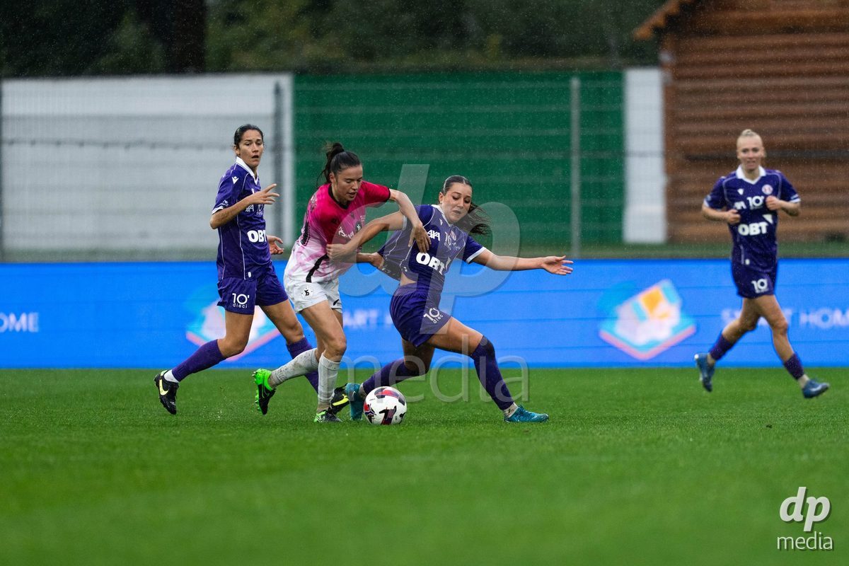 YVERDON-LES-BAINS, SWITZERLAND - OCTOBER 18: 8 Laura Kott of FC Rapperswil-Jona challenging with the ball during the AXA Women's Super League match between FC Yverdon Women and FC Rapperswil-Jona at Stade Municipal on October 18, 2026 in Yverdon-les-Bains, Switzerland.